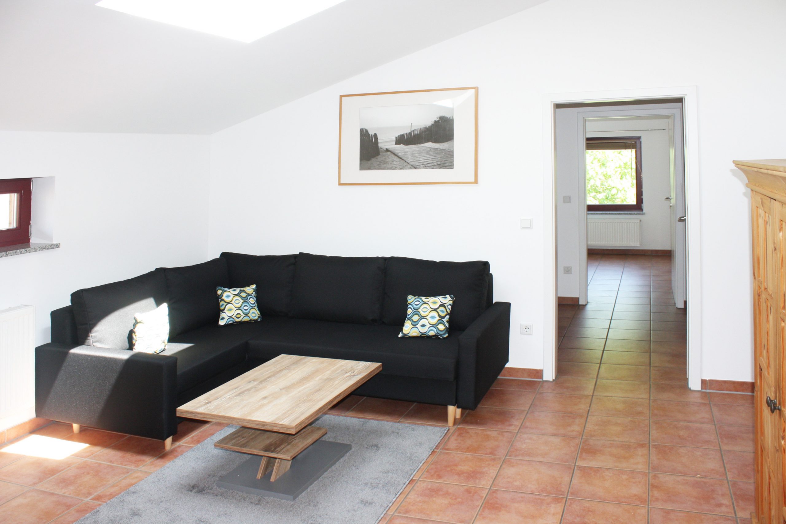 Kaiser Camping Outdoor Resort Bad Feilnbach Ferienwohnung Wohnzimmer mit Couch